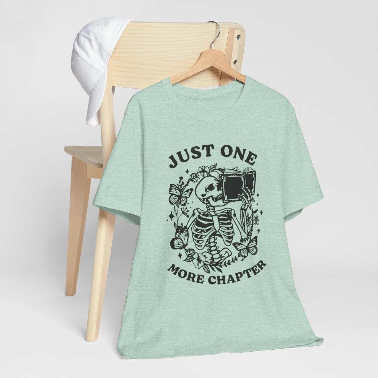 Just One More Chapter Unisex Tee - Cute Skeleton Reading Shirt for Book Lovers