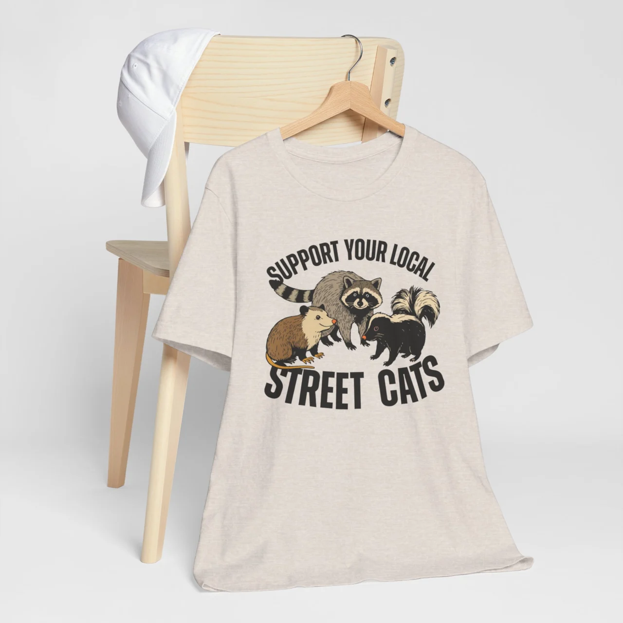 Funny raccoon and opossum t-shirt with Support Your Local Street Cats t-shirt phrase, casual animal lover humor shirt.