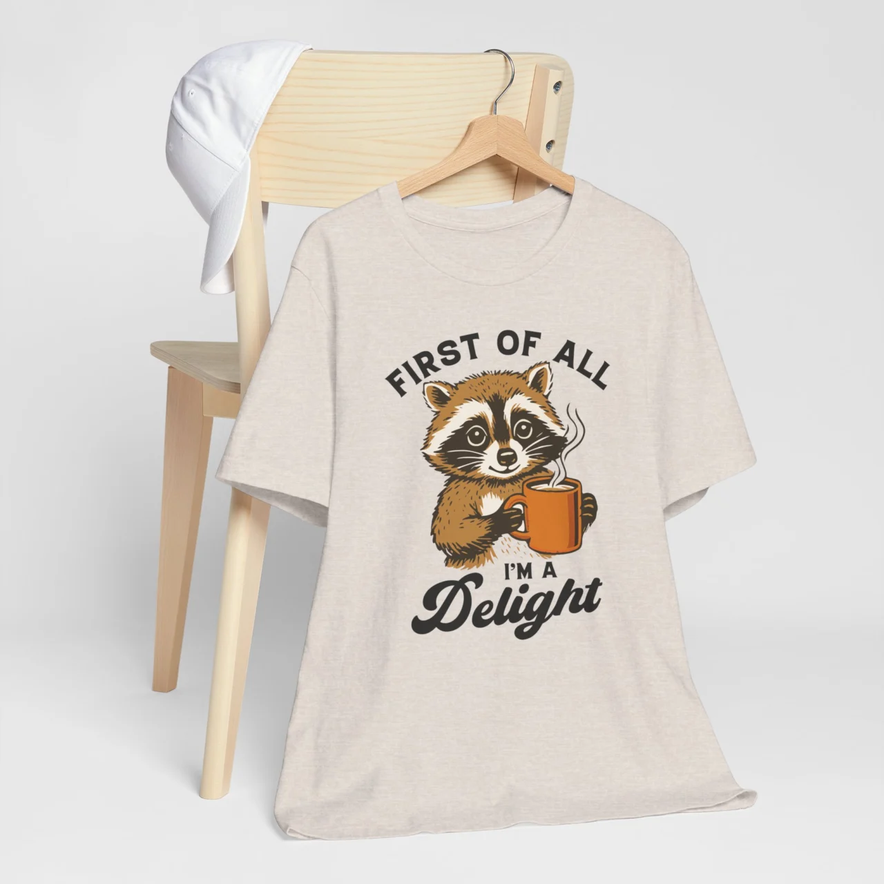Funny raccoon t-shirt with First of All Im a Delight raccoon shirt phrase, sarcastic casual humor shirt