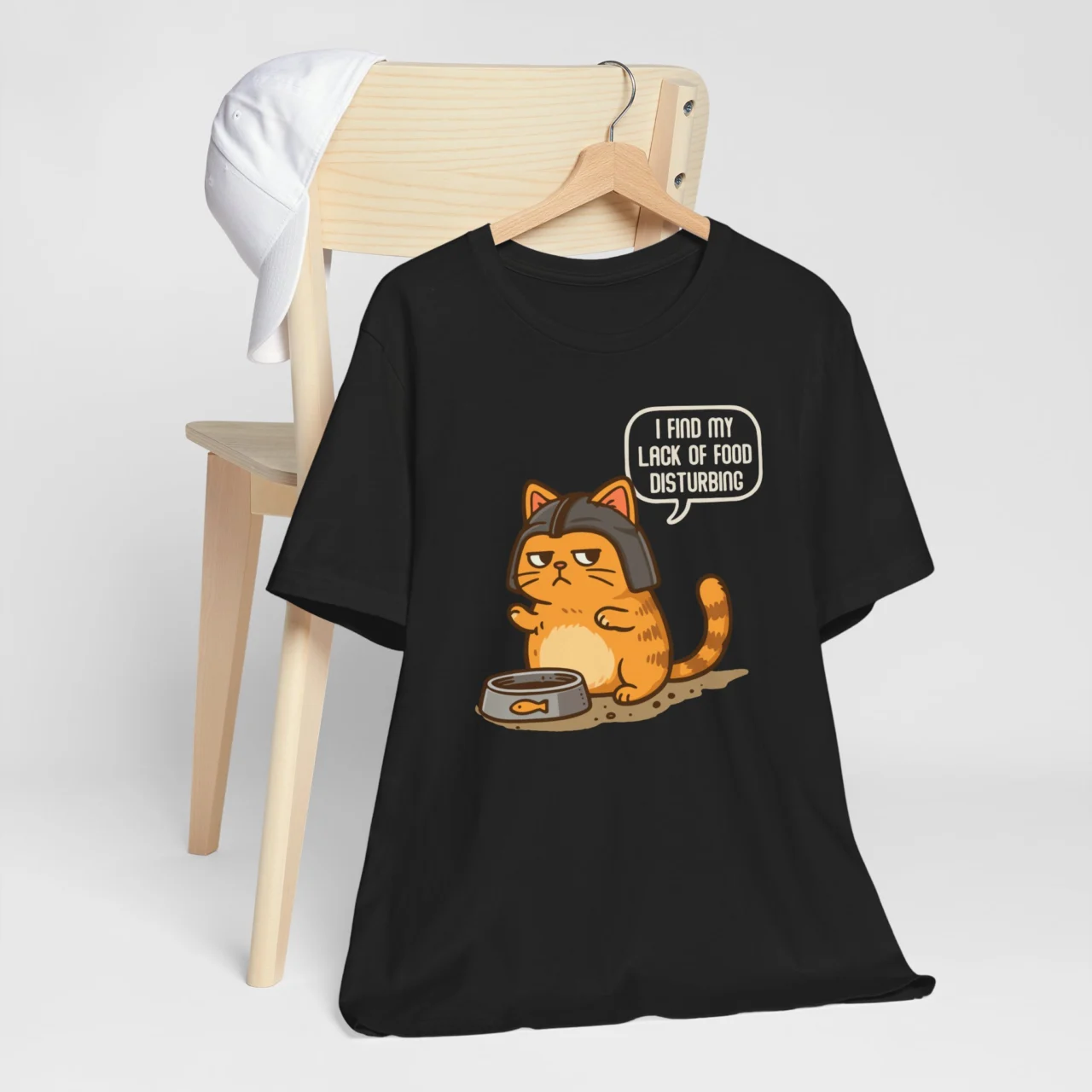 Funny cat parody t-shirt with quote I Find My Lack of Food Disturbing shirt with a dramatic hungry cat design