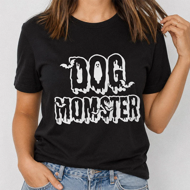 Woman wearing a black spooky Dog Momster Shirt – Funny Dog Mom Halloween Tee with melting ghost typography reading Dog Momster
