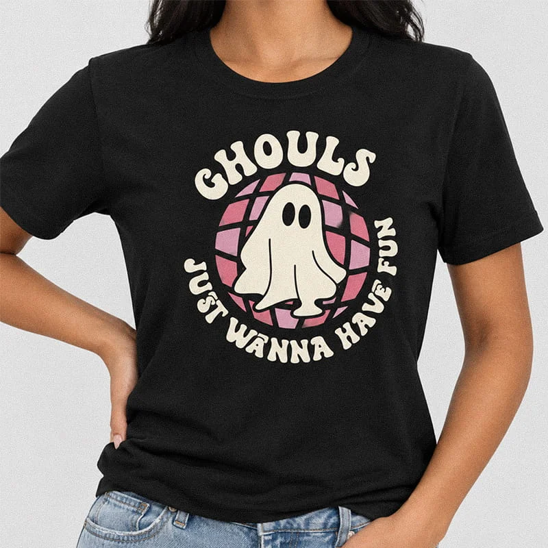 Woman wearing a black Ghouls Just Wanna Have Fun Shirt - Retro Halloween Ghost Tee featuring a ghost inside a pink disco ball graphic