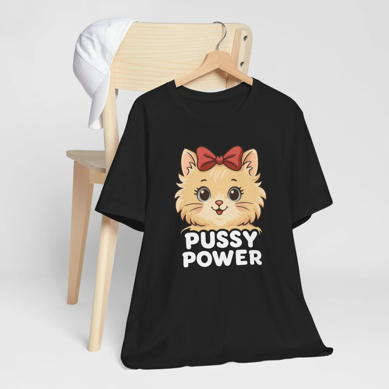 Pussy Power Cute Cat Graphic Tee in Black with Kawaii Cat and Red Bow Design