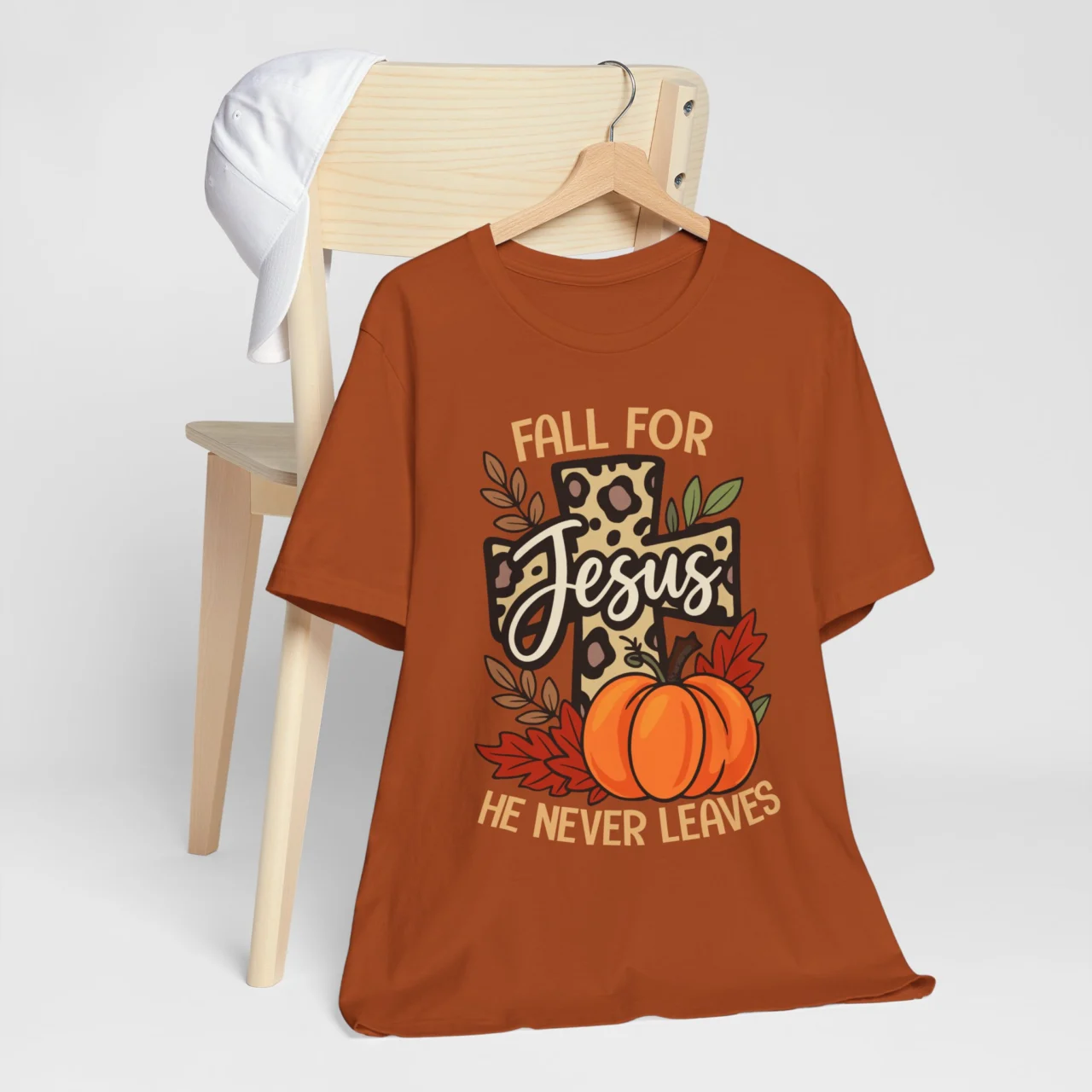 Fall For Jesus He Never Leaves Shirt - Christian Fall Tee, Thanksgiving Family Matching Shirt, Faith Pumpkin T-Shirt, Bible Verse Shirt for Women