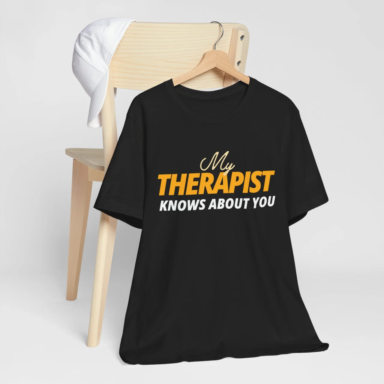 My Therapist Knows About You Funny Graphic Tee, Sarcastic Therapy Humor Shirt in Black with Orange Text
