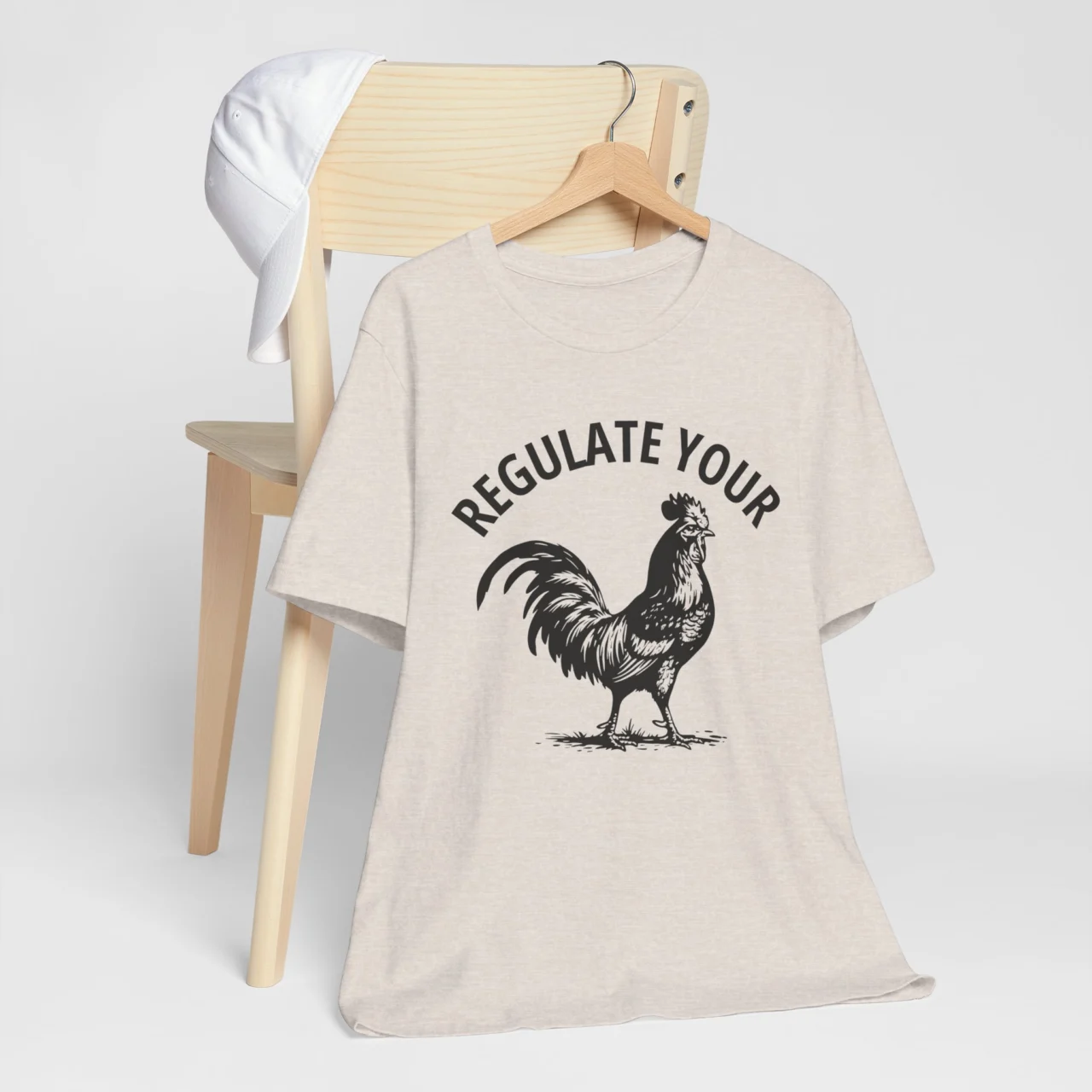 Regulate Your Rooster Funny Adult Graphic Tee in Heather Dust with Vintage Rooster Design