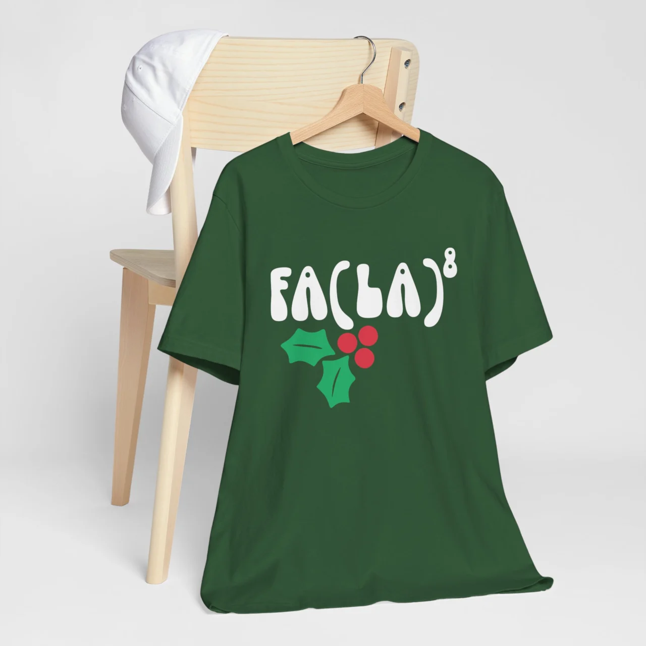 Evergreen Fa(La)8 Shirt in white bold text with holiday holly, a Funny Math Science Christmas Teacher Tee design.
