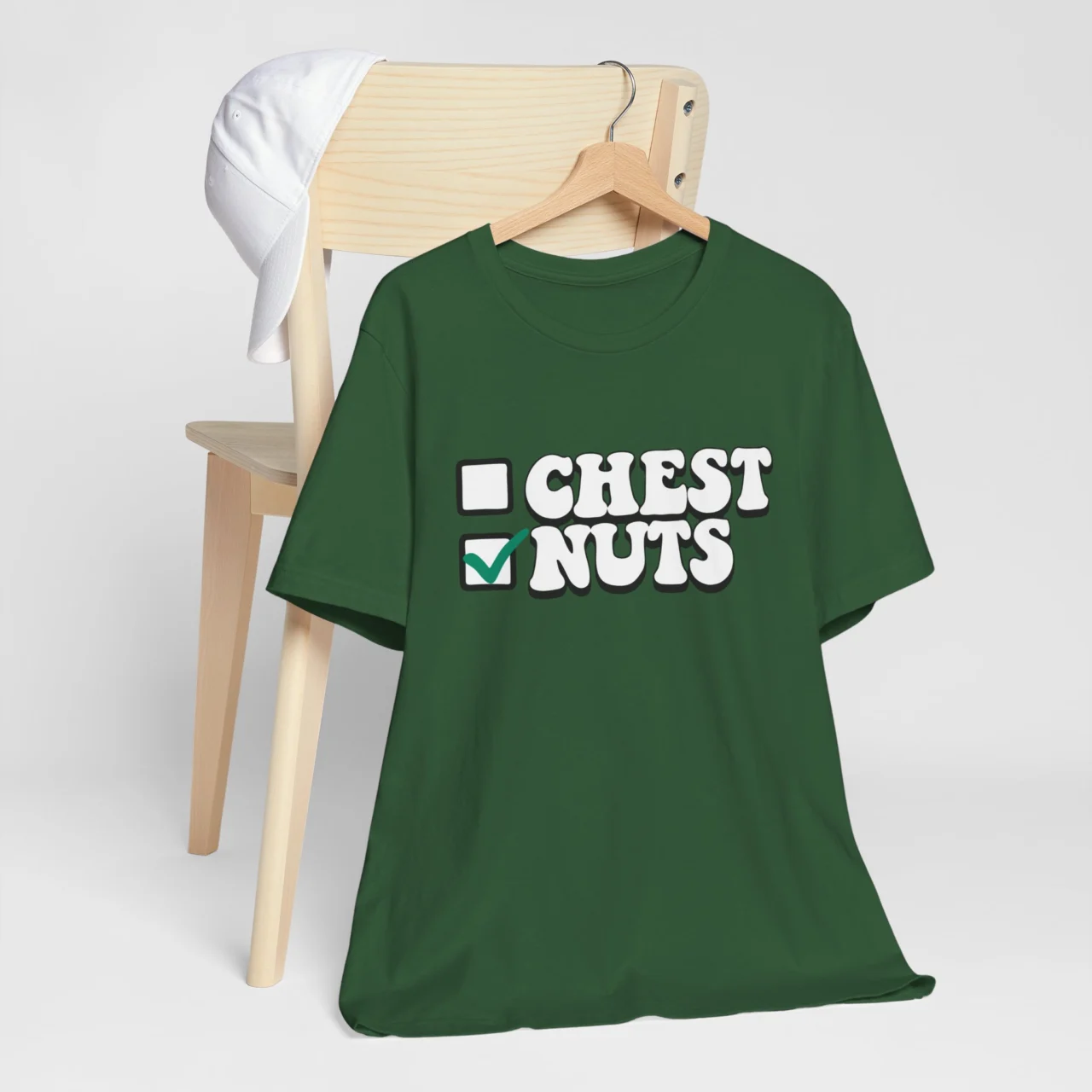 Chest Nuts Men's Shirt in dark green with the 'Nuts' box checked, a Funny Adult Naughty Christmas Tee for him with a suggestive holiday double entendre.