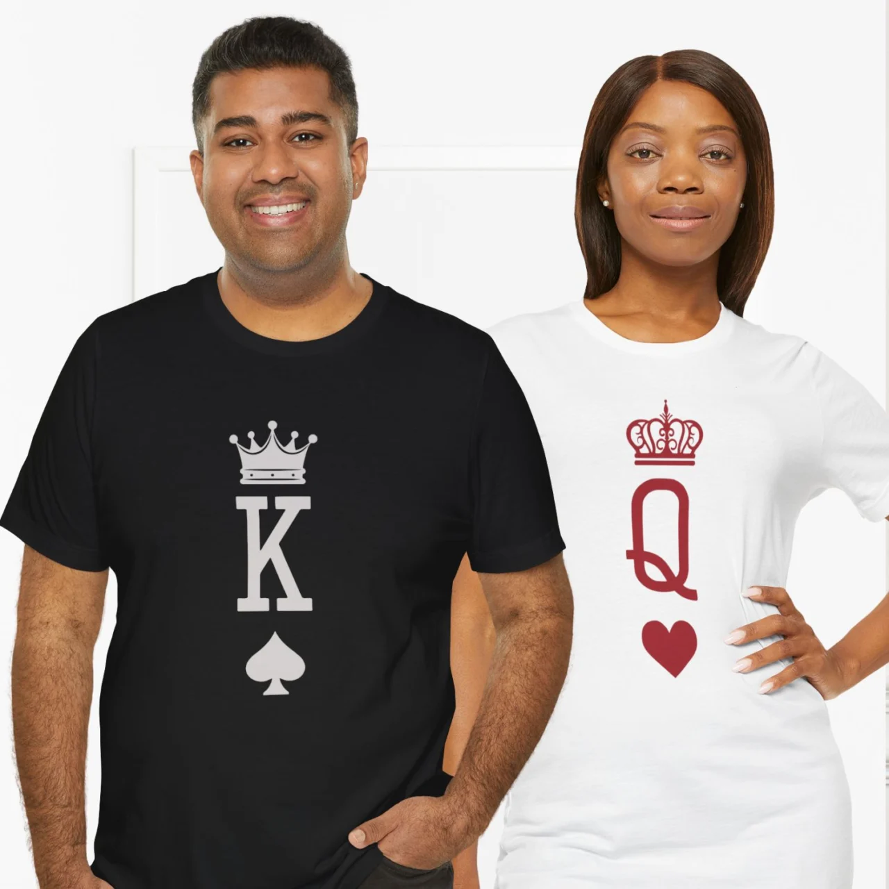 King of Spades & Queen of Hearts Matching Couple Shirts featuring a man in a black King of Spades tee and a woman in a white Queen of Hearts tee with crown icons.